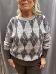 Beige och blå stickad tröja med rutor