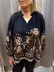 Svart mönstrad blus