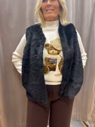 Svart fuskpäls väst