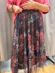 Tyllkjol med leo och blommor