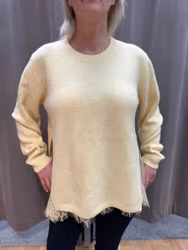 Ljusgul stickad tröja med spets