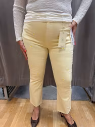 Ljusgula jeans med blommor