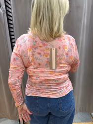 Rosa långärmad topp med blommor