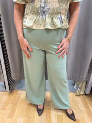 Mintgröna stretchiga högmidjade byxor