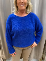 Kornblå fluffig tröja