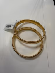 Guldiga Ärmhållare