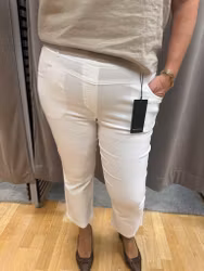 Vita dra på byxor i superstretch