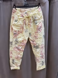 Gula magiska byxor med blommor