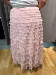 Rosa tyllkjol med hjärtan