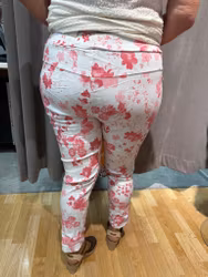 Vita magiska byxor med ljusröda blommor