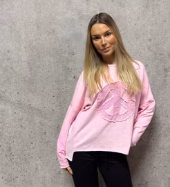Rosa topp med peace-symbol