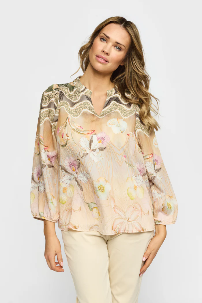 Sandfärgad V-ringad blus med orkidéer
