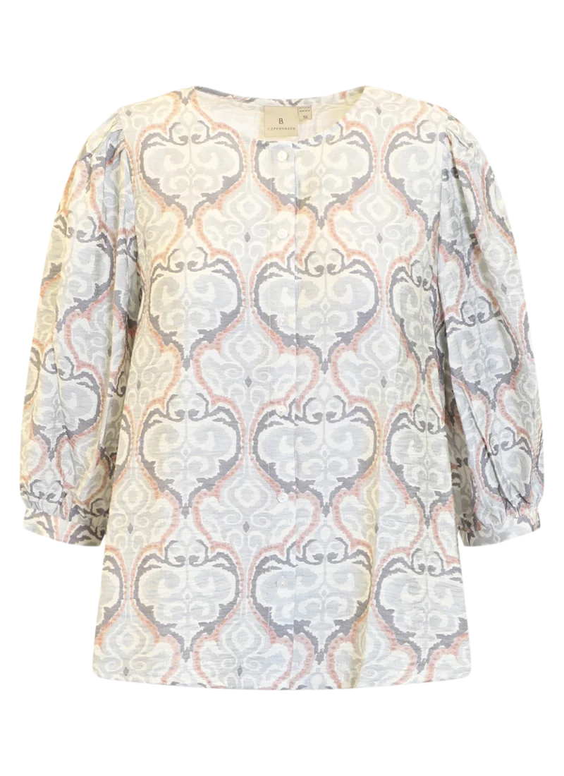 Mönstrad blus i grå och rosa toner