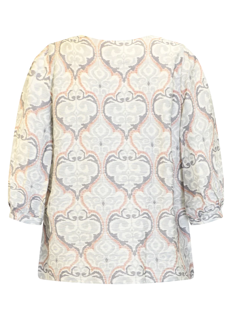 Mönstrad blus i grå och rosa toner