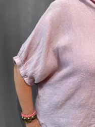 Rosa linneskjorta med volang