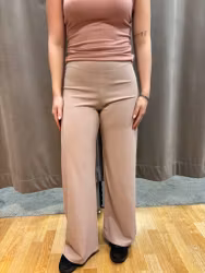 Puderrosa stretchiga högmidjade byxor