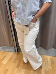 Vita vida jeans med nitar