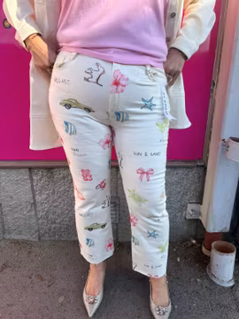 Cremefärgade jeans med somriga motiv