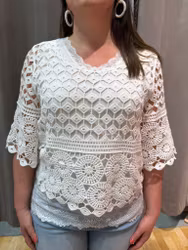 Cremevit virkad topp