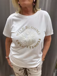 T-shirt med vita blommor och guld