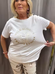 T-shirt med vita blommor och guld