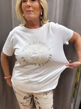 T-shirt med vita blommor och guld