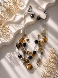 Halsband och örhängen beige och grå