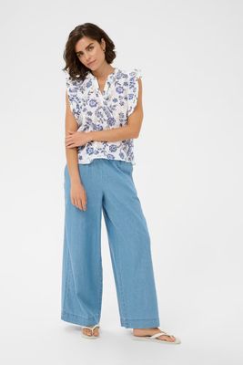 Vit och blå armlös topp med hålbrodyr