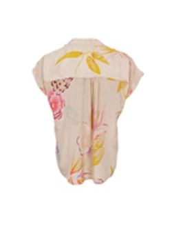Beige blus med blommönster och holkärm