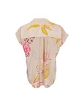 Beige blus med blommönster och holkärm