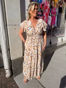 Maxiklänning i cremevitt med bruna/blå blommor
