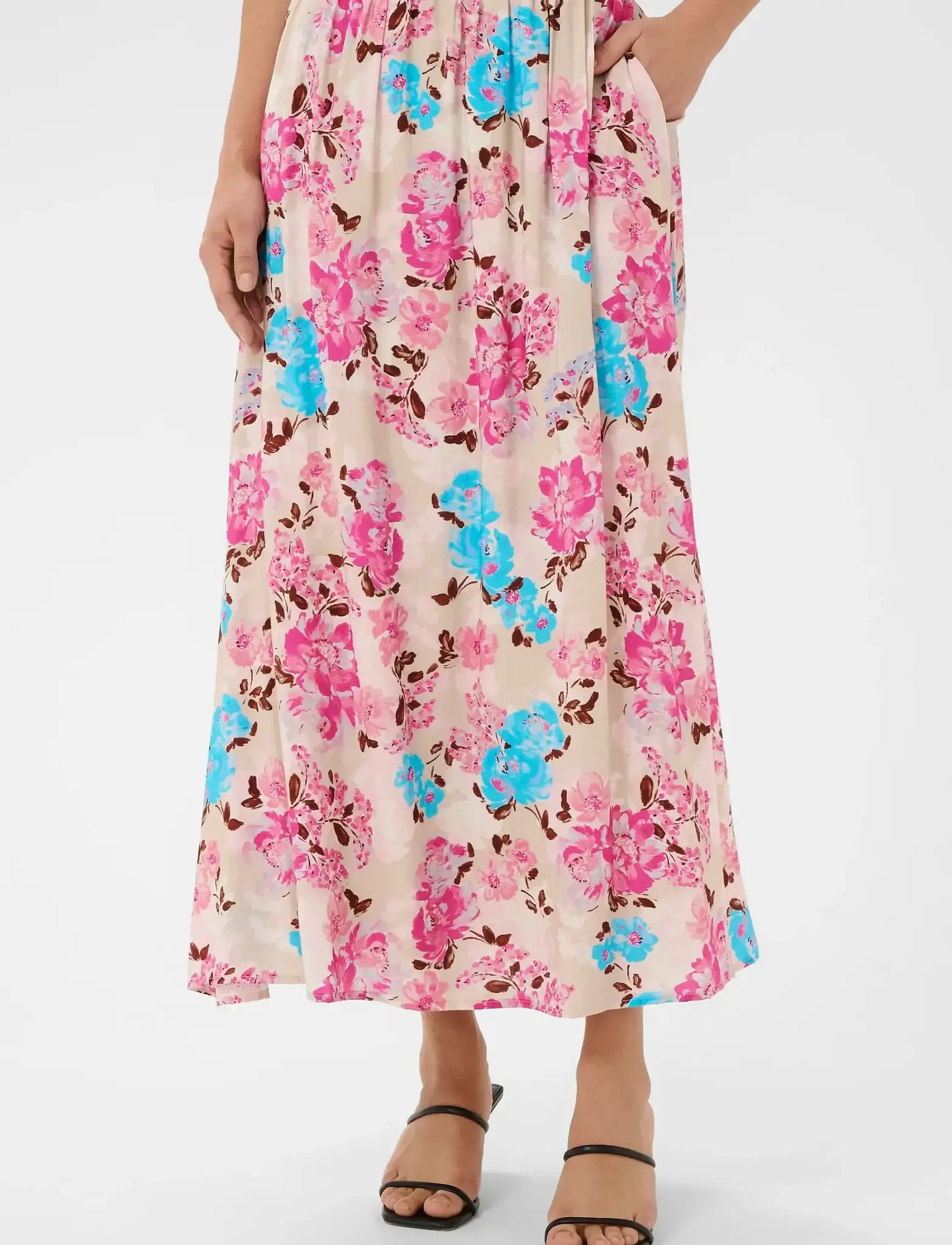 Beige kjol med rosa och blå blommor