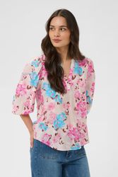 Beige blus med rosa och blå blommor