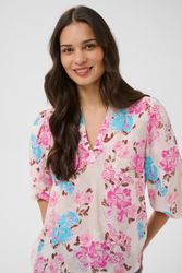 Beige blus med rosa och blå blommor