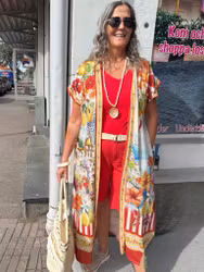 Glittrig kaftan Dolcevita med medelhavsmotiv