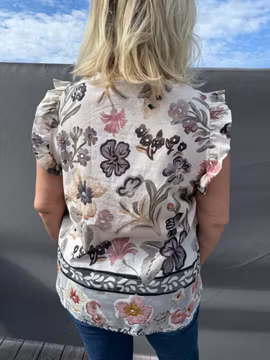 Mönstrad topp med volangärm