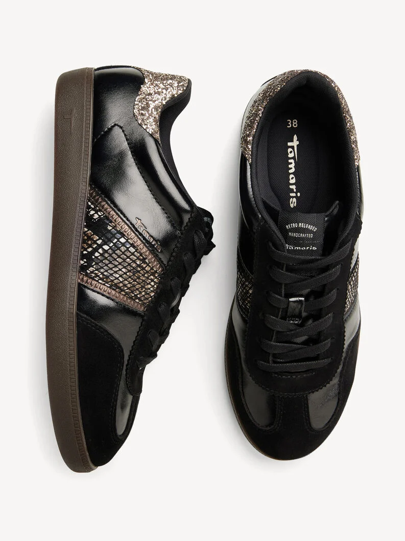 Svarta sneakers med ormskinn och glitter
