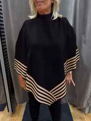 Svart poncho med beige mönster