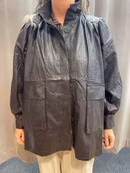 Mörkbrun oversize jacka i skinnimitation