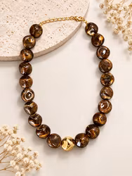 Brunt halsband med guld
