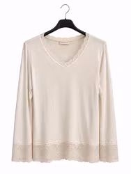 Beige v-ringad topp med spets