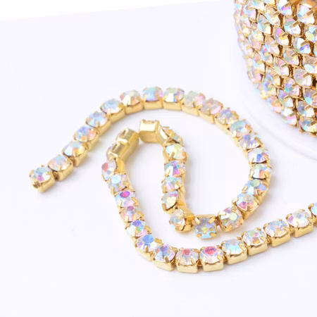 Strasslänk Crystal AB/gold 4mm, 10 yard, rulle