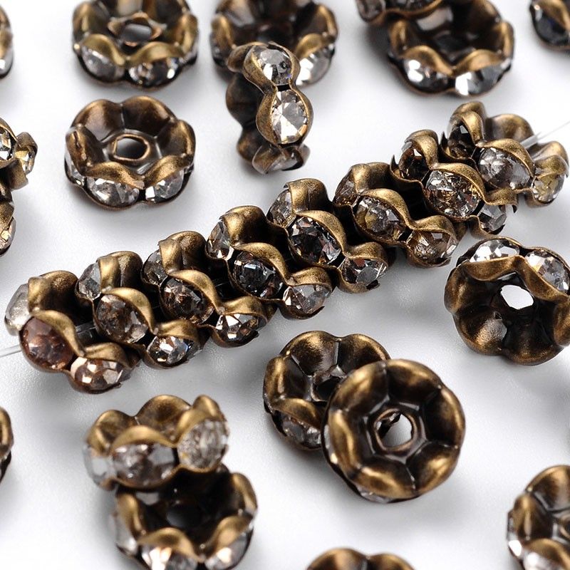 Strassrondeller wave clear/Antique Bronze  8mm