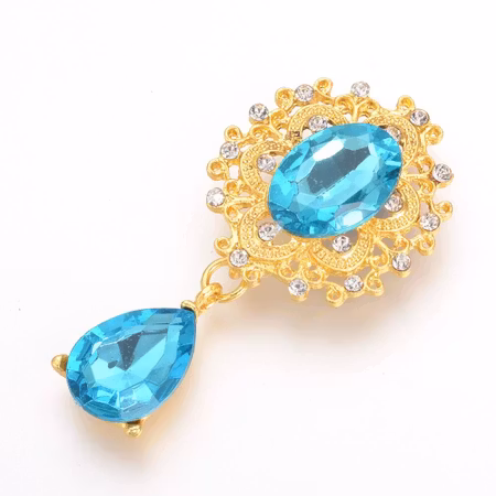 Kristallsmycke gold 56x28mm (flera färger)