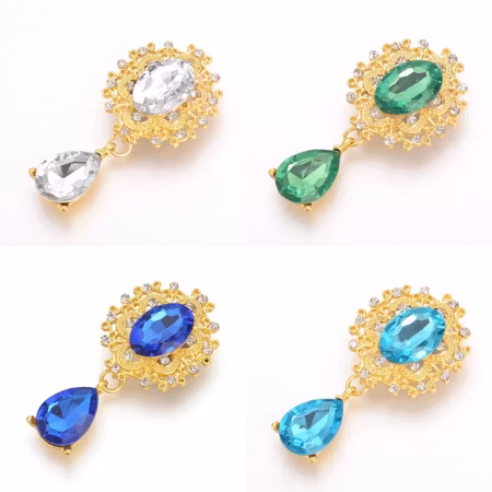 Kristallsmycke gold 56x28mm (flera färger)