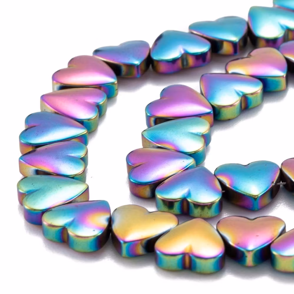 Syntetiska hematite hjärtan mixade färger på sträng 8mm