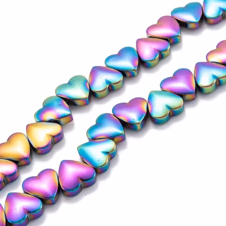 Syntetiska hematite hjärtan mixade färger på sträng 8mm