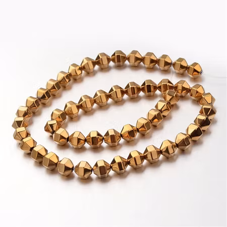 Syntetiska hematite polygon guldfärgade på sträng 8mm