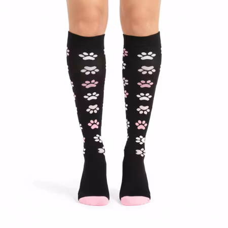 Svart med tassar stödstrumpa