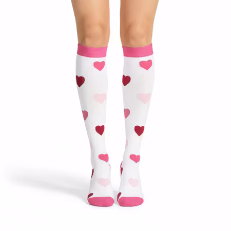 Stödstrumpa med rosa hjärtan